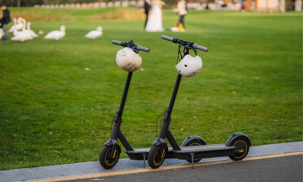 Two scooters parked on the roadside