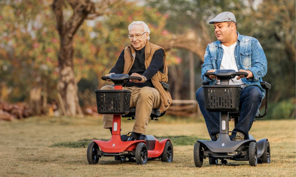 Elderly people driving scooters outdoors