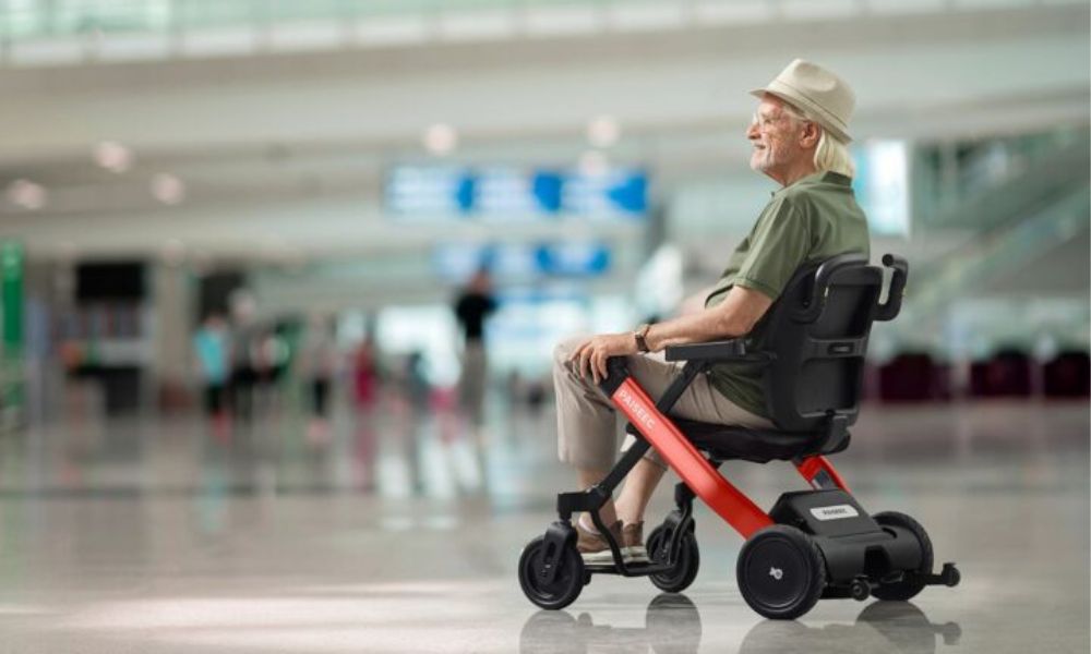 Elderly people driving lightweight foldable electric wheelchair indoors